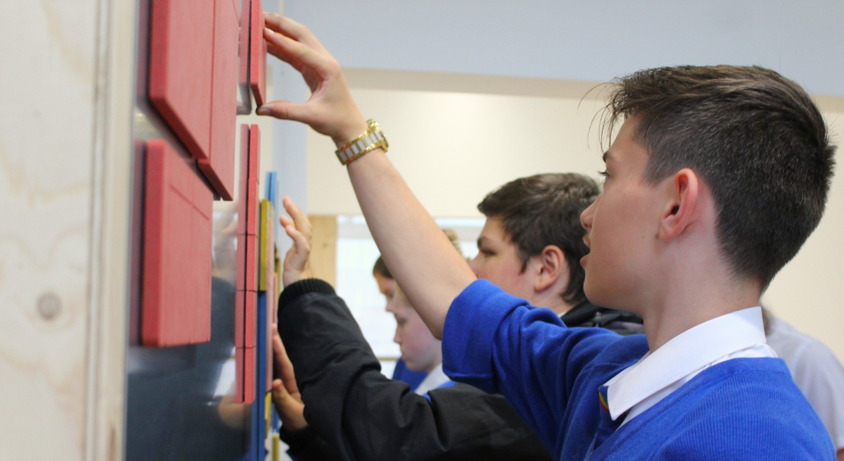 School children looking at Special Collections items